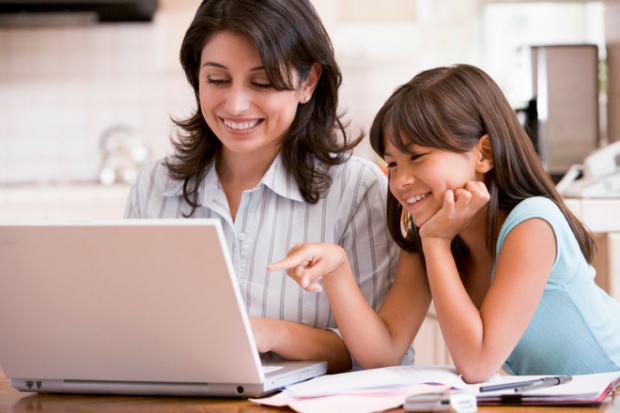 Woman and child at computer