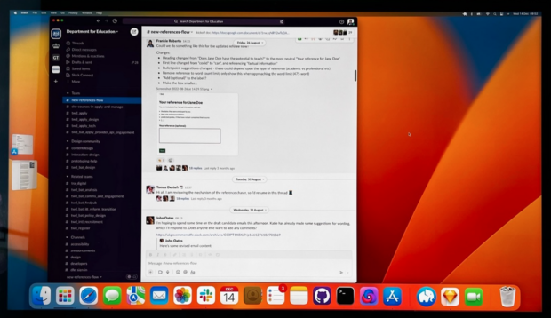 A laptop screen with the application 'Slack' open. People are collaborating online through Slack.